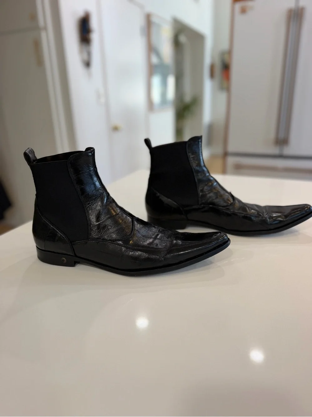 Dolce & Gabbana Black Pointed Eel skin Chelsea boots.